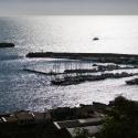 Porto turistico di Sciacca con barche e mare illuminato dal sole